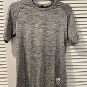 Small grey lululemon X soul cycle skull metal vent tech